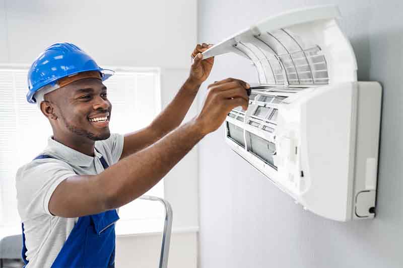 An air conditioner being installed